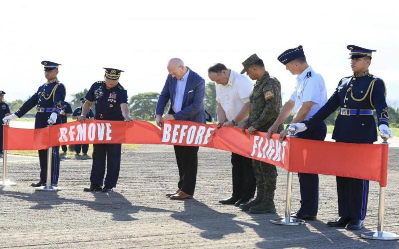 The CG, PAF, LtGen Stephen P Parreño PAF assist Sec Gilberto C Teodoro Jr and Mr Robert Y Ewing, who lead the ribbon cutting to mark the completion of BAB Runway Rehabilitation